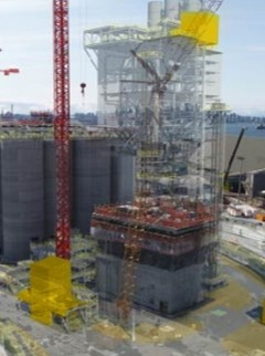 Fotografía de una instalación en construcción con un modelo 3D superpuesto para indicar los planos de diseño